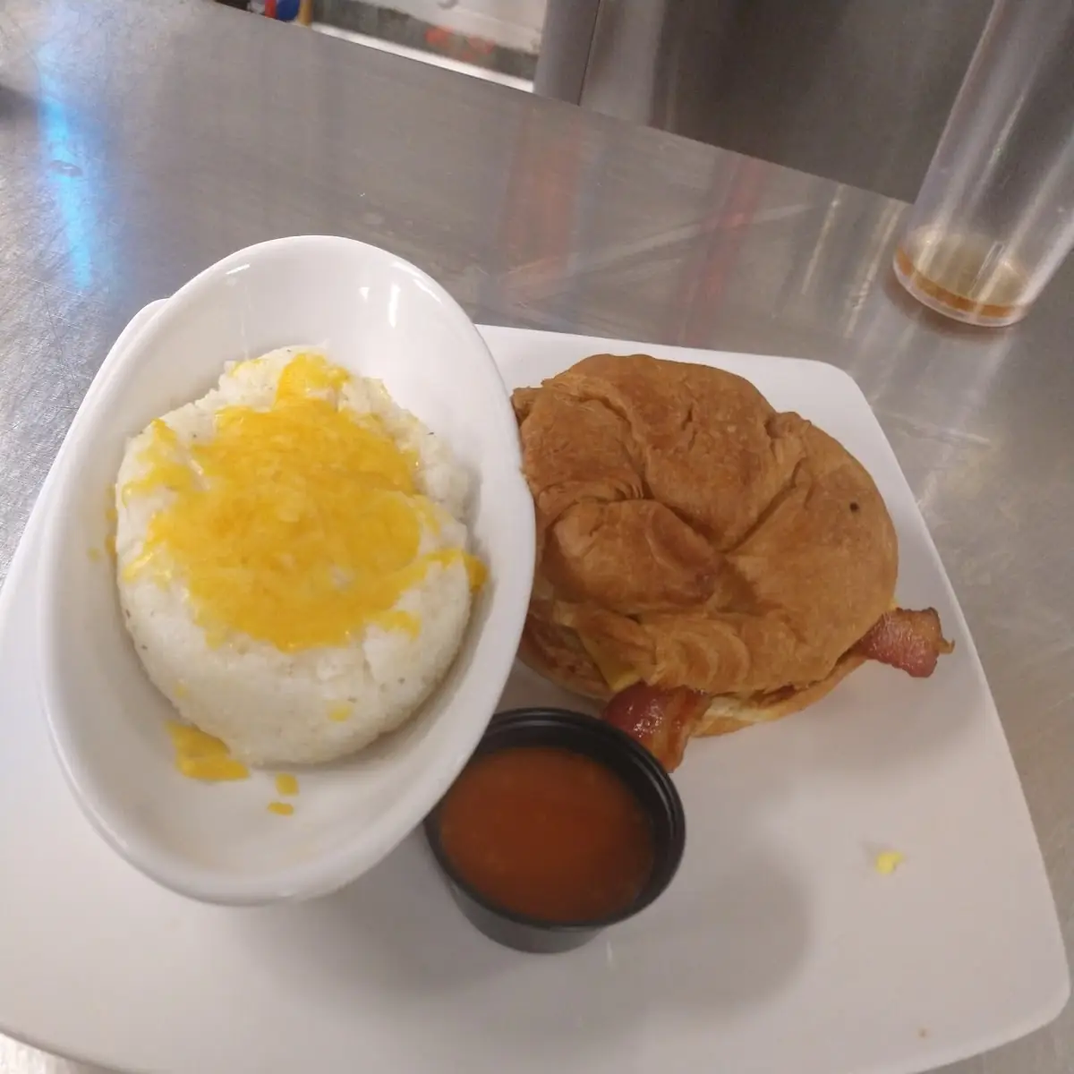 Grits with Bacon Egg N Cheese Sandwich