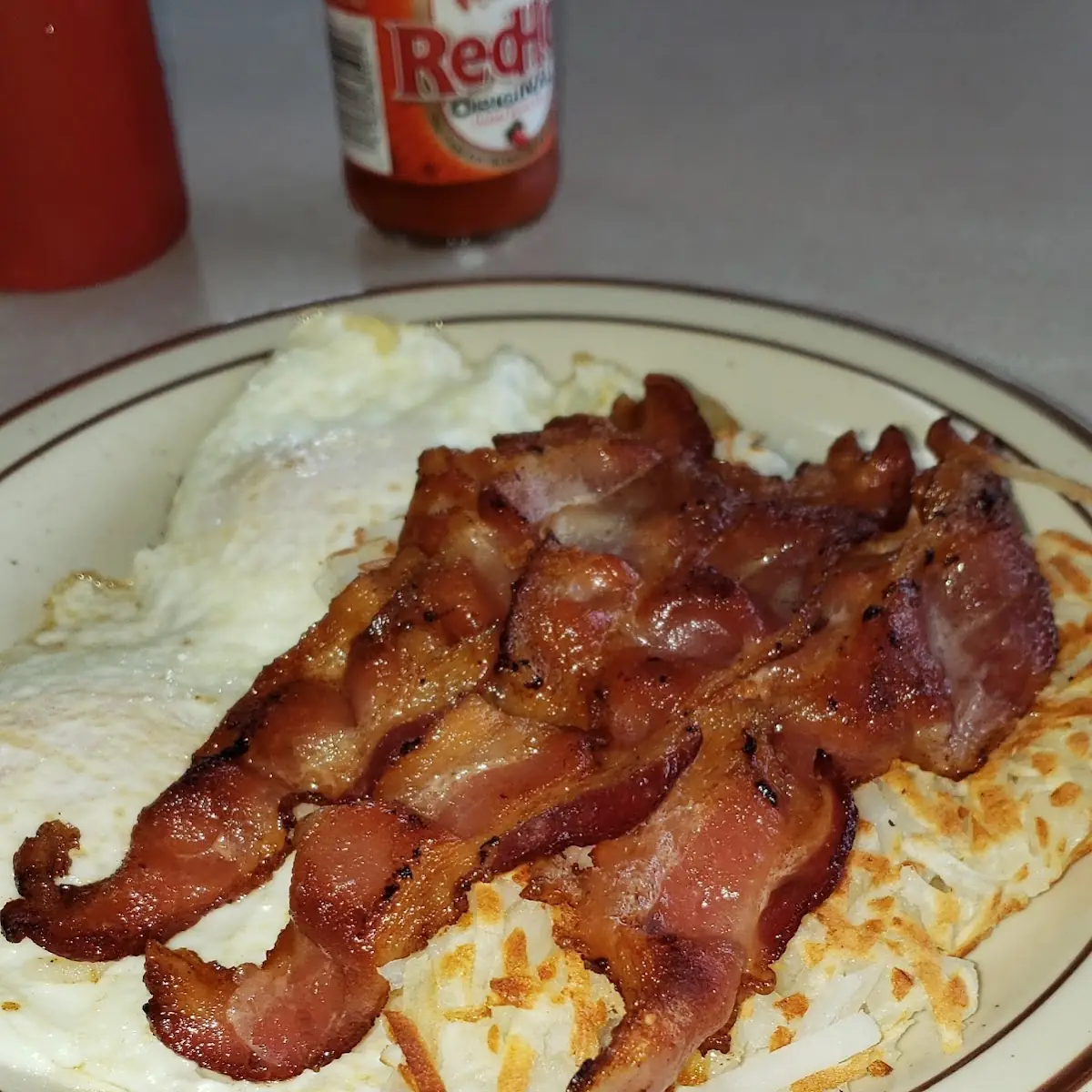 Bacon Eggs over Easy and Hashbrowns