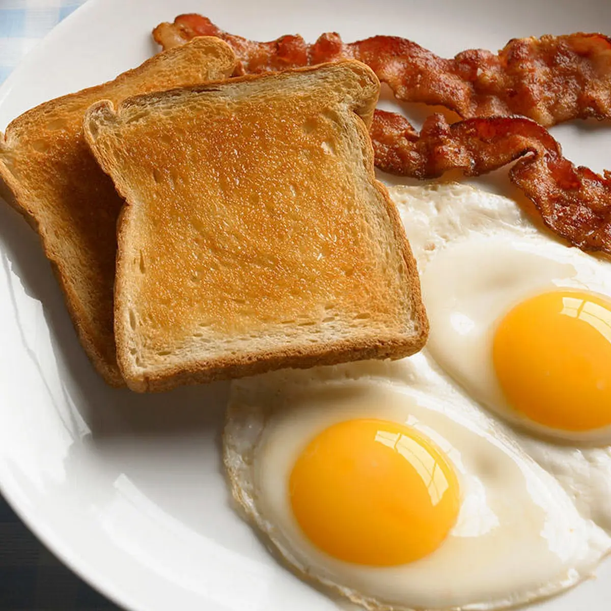 Two Eggs over Easy with Bacon and Toast
