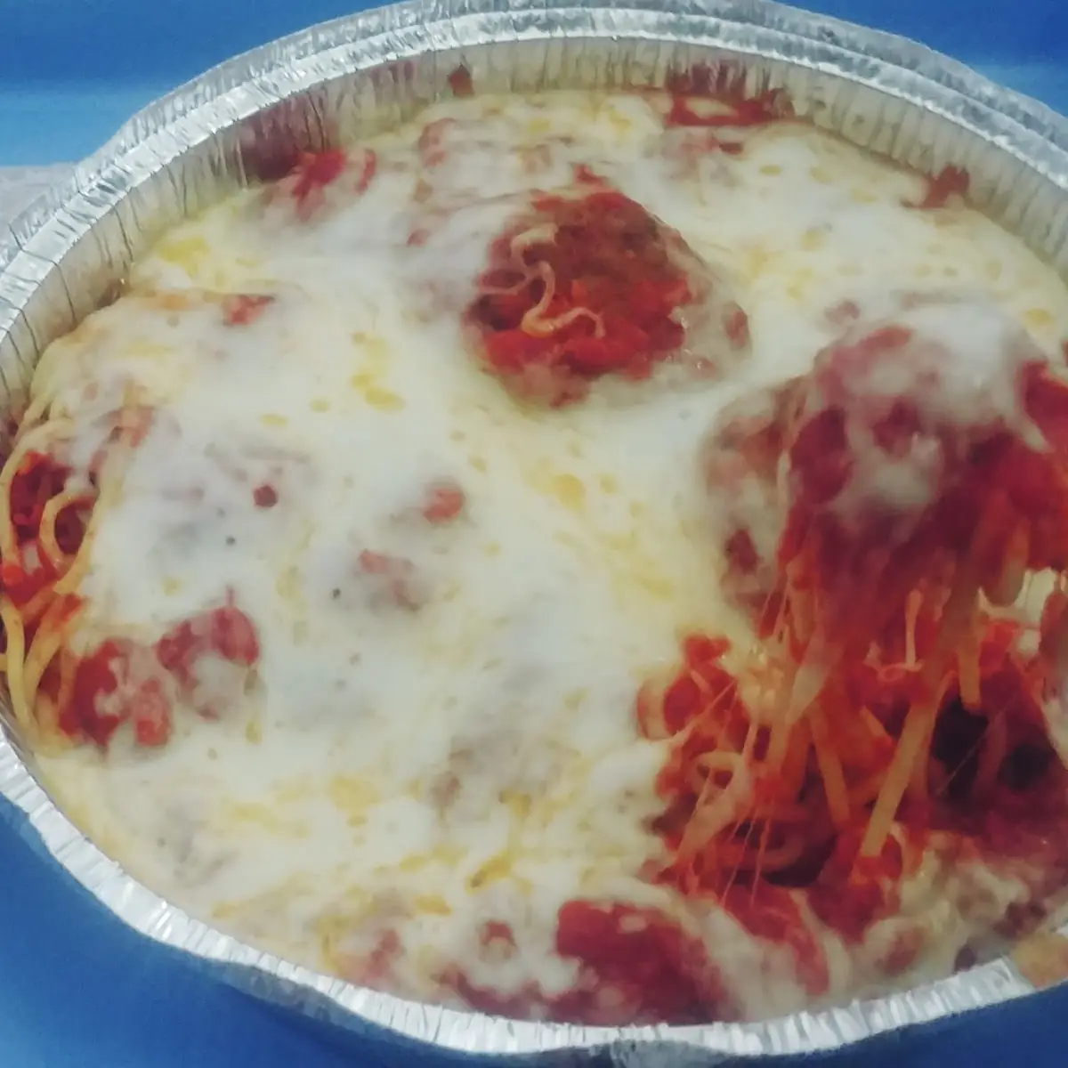 Spaghetti Meatballs Covered in Cheese