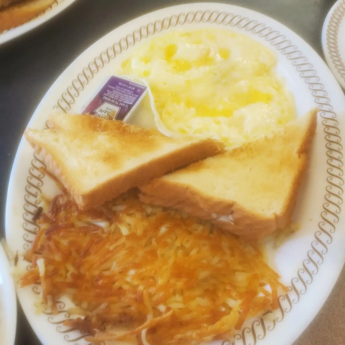 Eggs Hash Browns Toast and Jelly