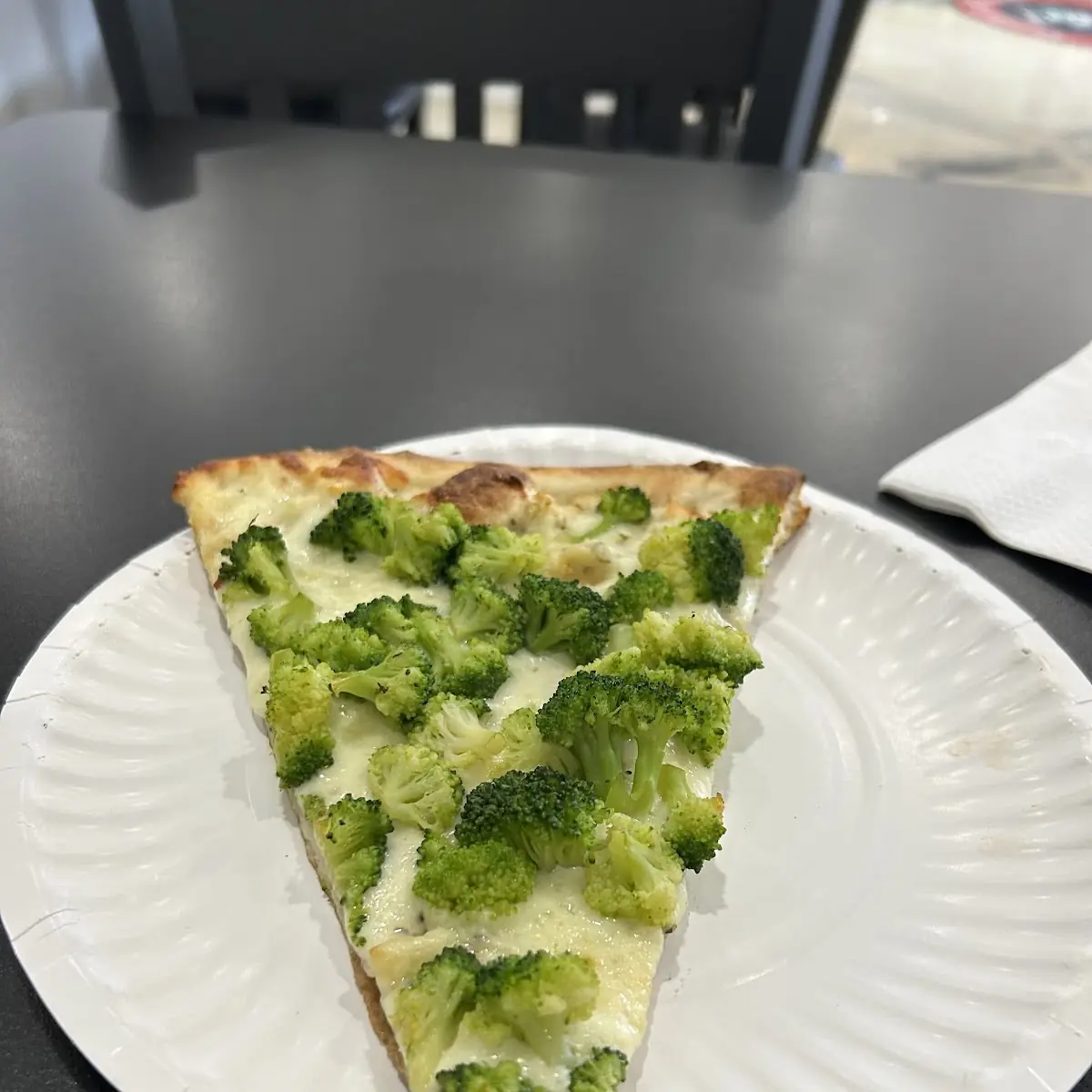 Creamy Broccoli Pizza Slice