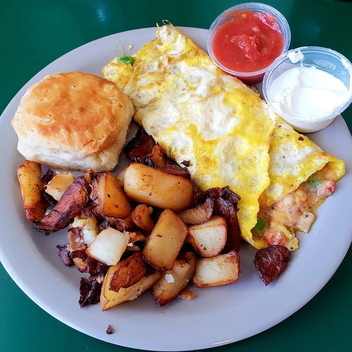 Fiesta Omelette with Home Fries and a Biscuit