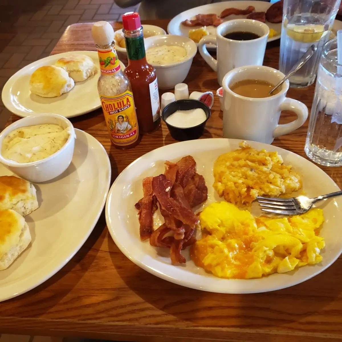 Scrambled Eggs with Cheese Hashbrown Casserole Bacon Biscuits and Gravy