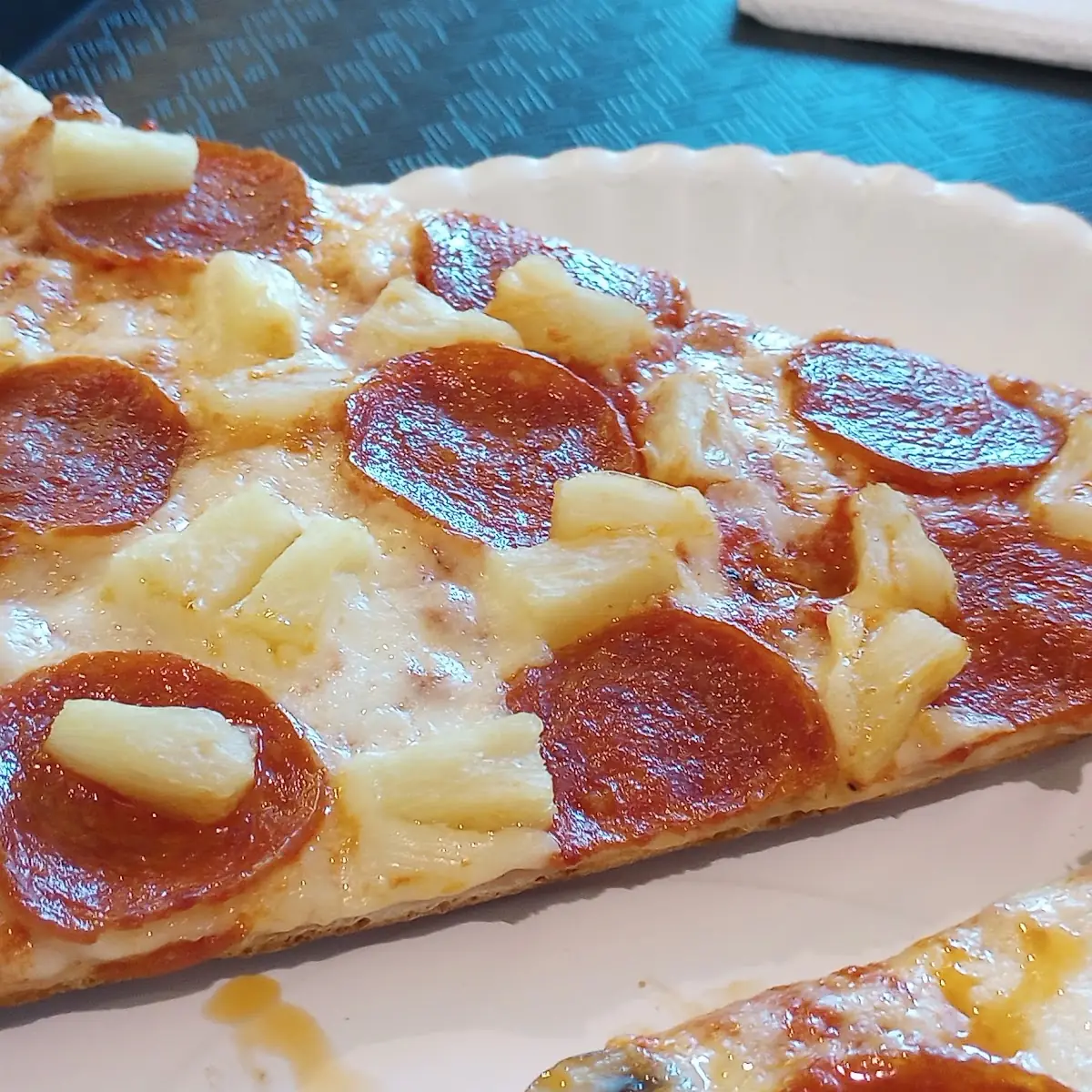 Pepperoni Pizza Slice with Pineapple