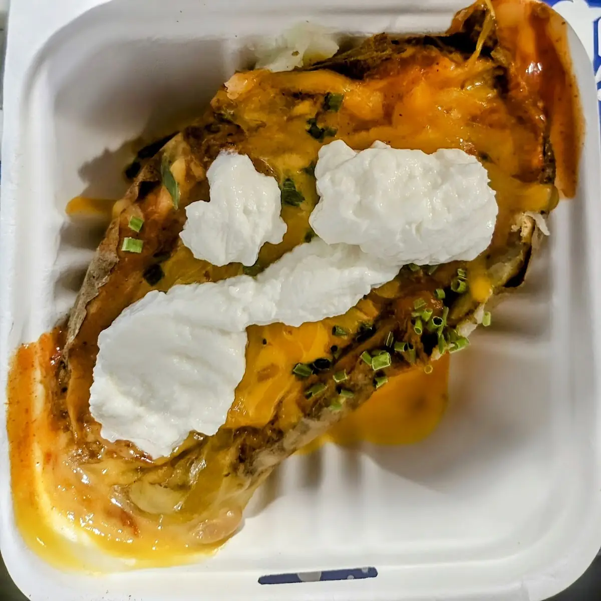 Loaded Bake Potato with Chili Cheese and Bacon Bits