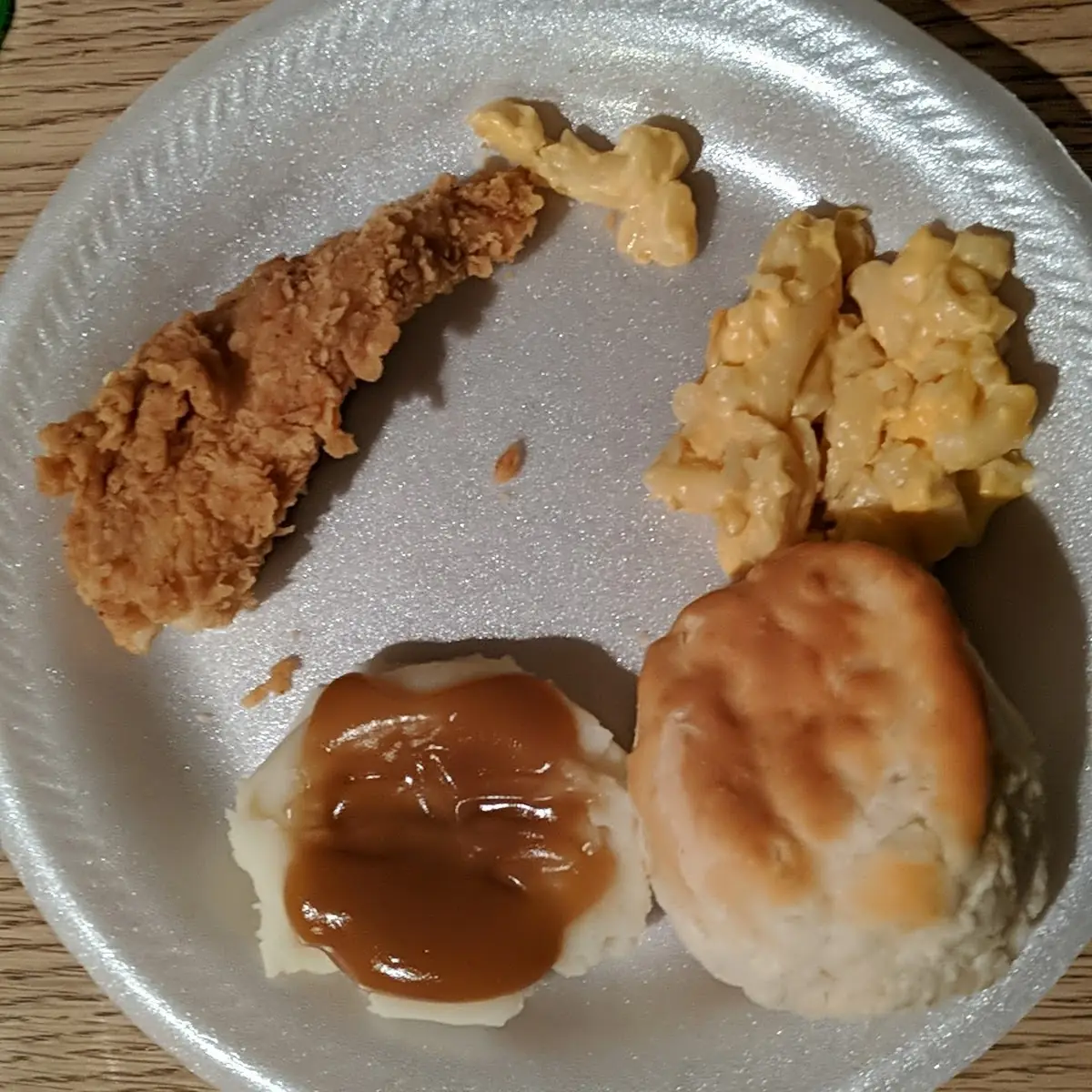 Fried Chicken Strip Mashed Potatoes and Gravy Macaroni and Cheese and a Biscuit