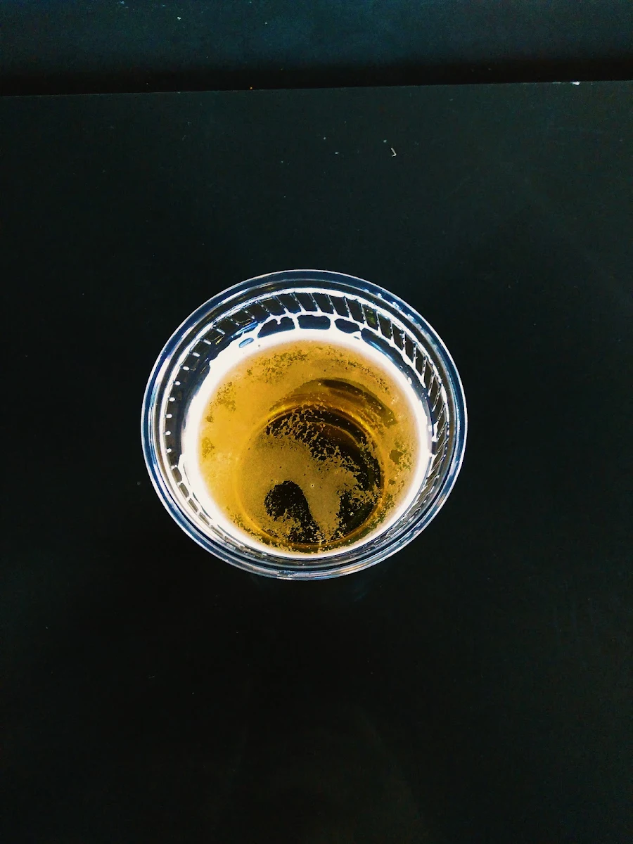 Dollar Rolling Rock Ina Plastic Cup