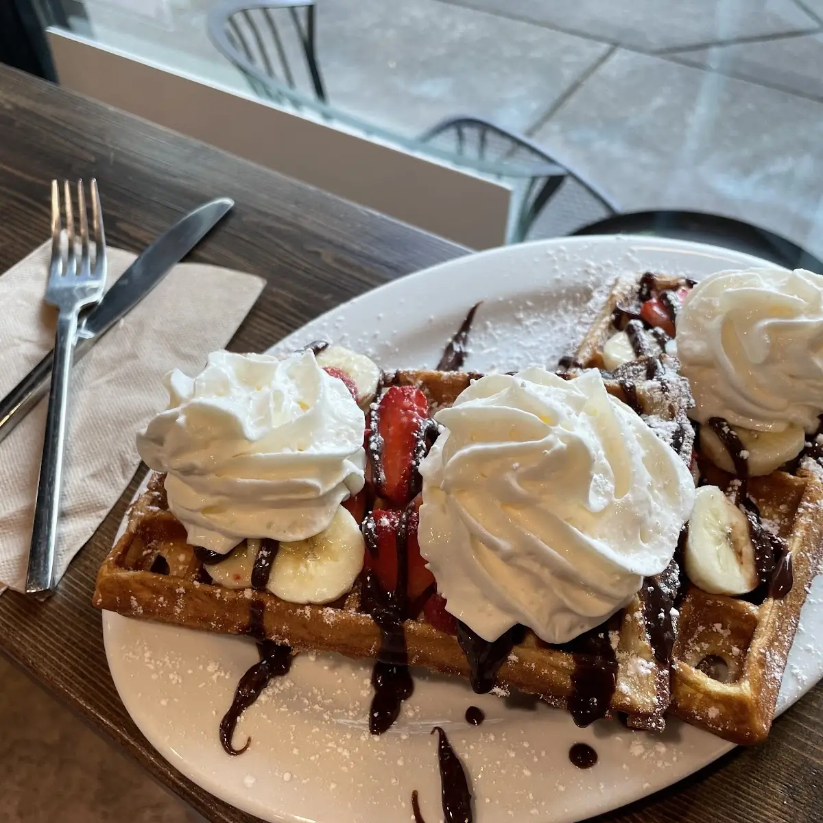 With Nutellae Glaze & Whipped Cream