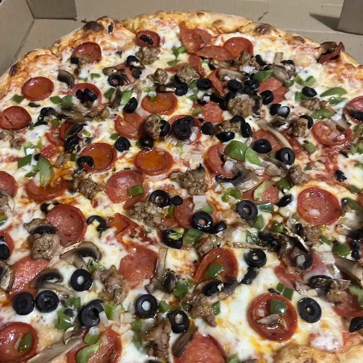 Loaded Pepperoni Sausage and Mushroom Pizza