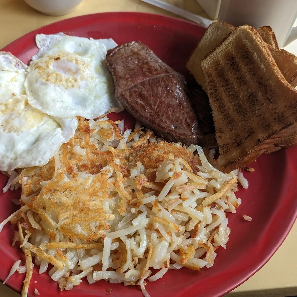 Steak and Eggs with Hash Browns and Toast