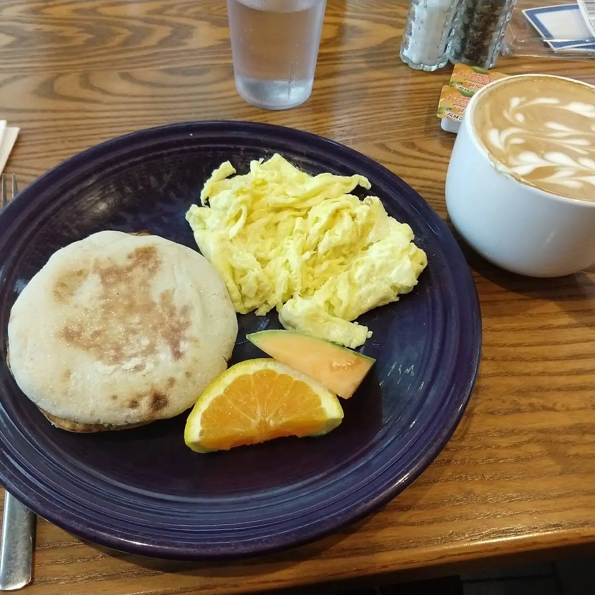 Scrambled Eggs Hash Browns and English Muffin