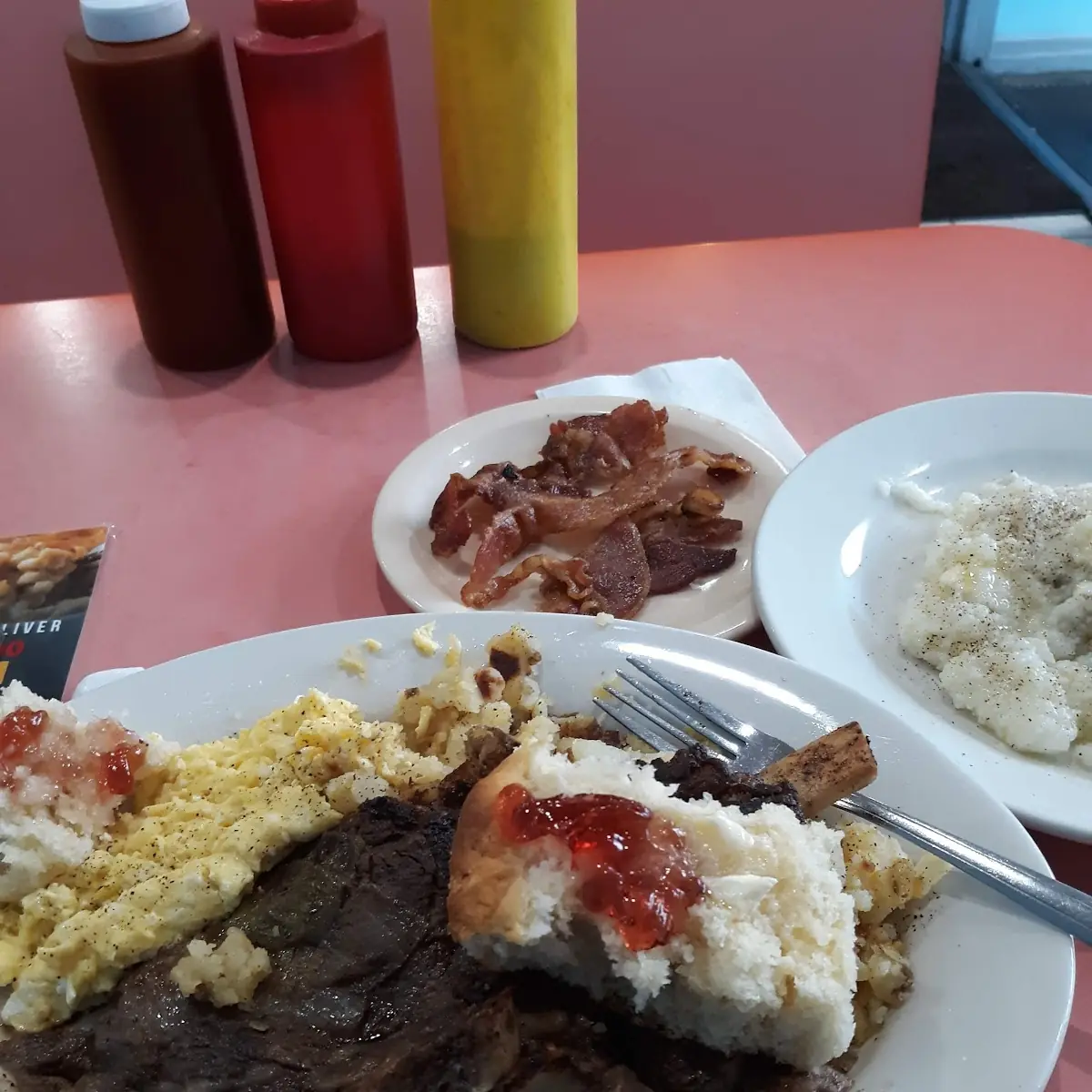 Steak Eggs Grits Bacon and Biscuits