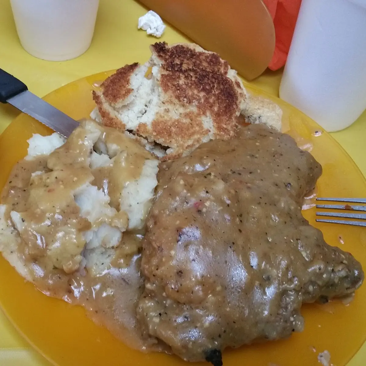 Smothered Pork Chops with Cabbage Mashed Potatoes and Hot Water Cornbread