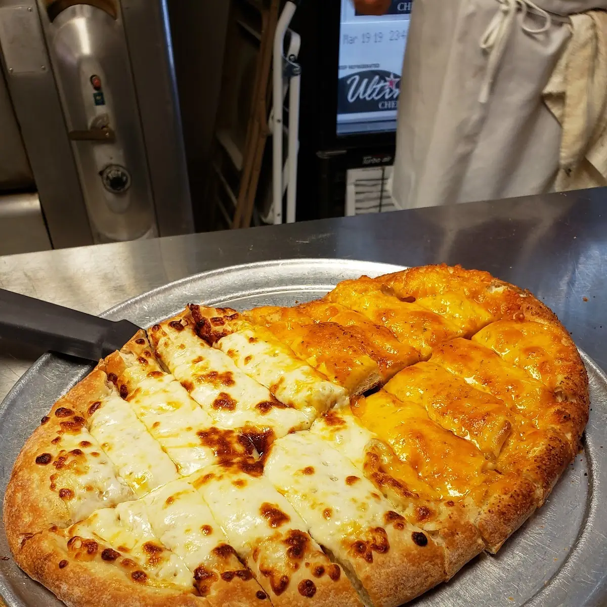 Half Regular and Half Cheddar Garlic Cheese Bread