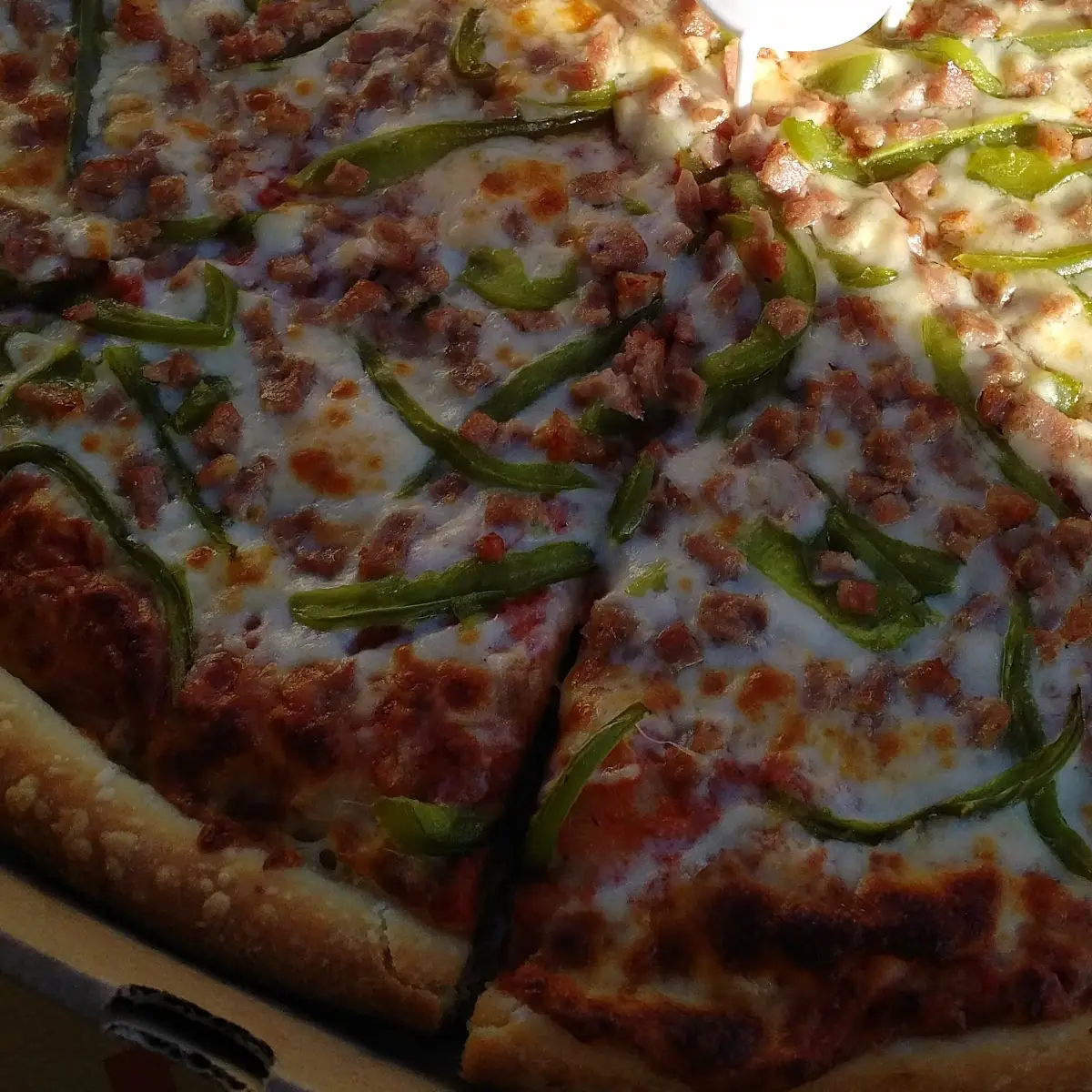 Sausage and Green Pepper Pizza Closeup