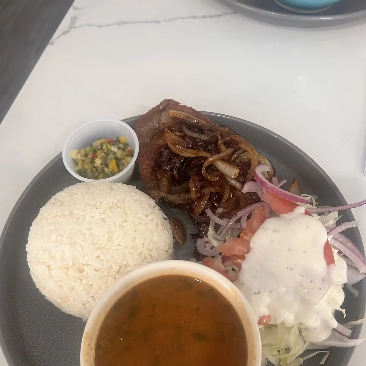 Bistec Encebollado