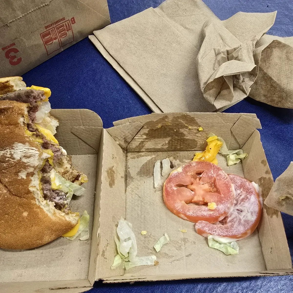 Quarter Pounder Deluxe Cheese Burger