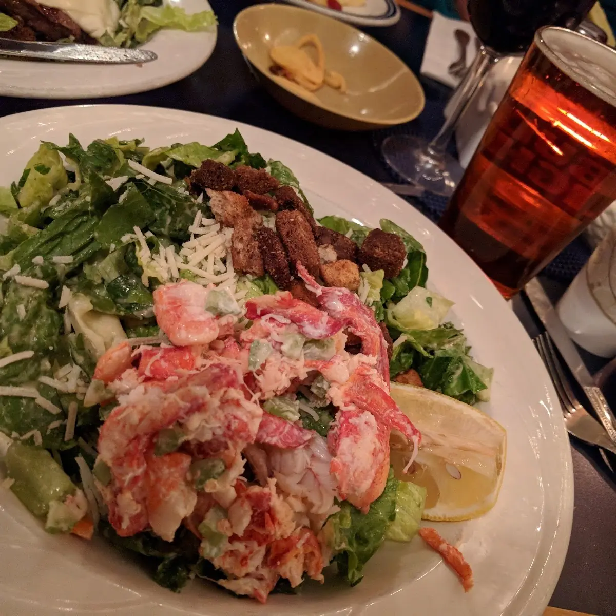 Crab Cakes over Caesar Salad