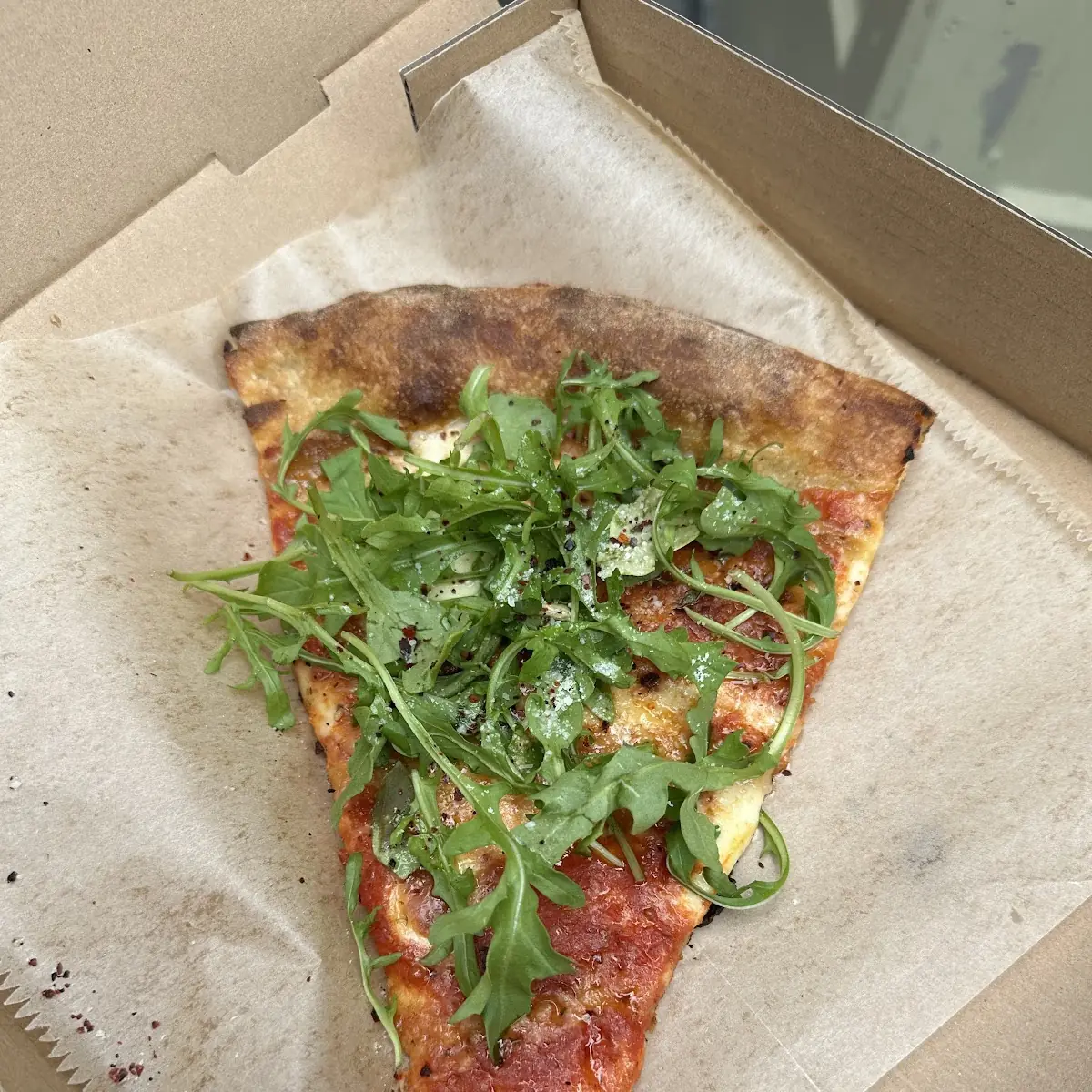 Pepperoni and Arugula Pizza Slices