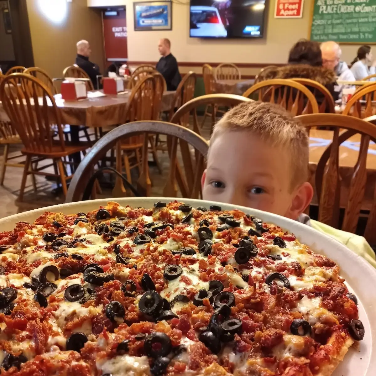 Bacon Sausage and Black Olive Pizza