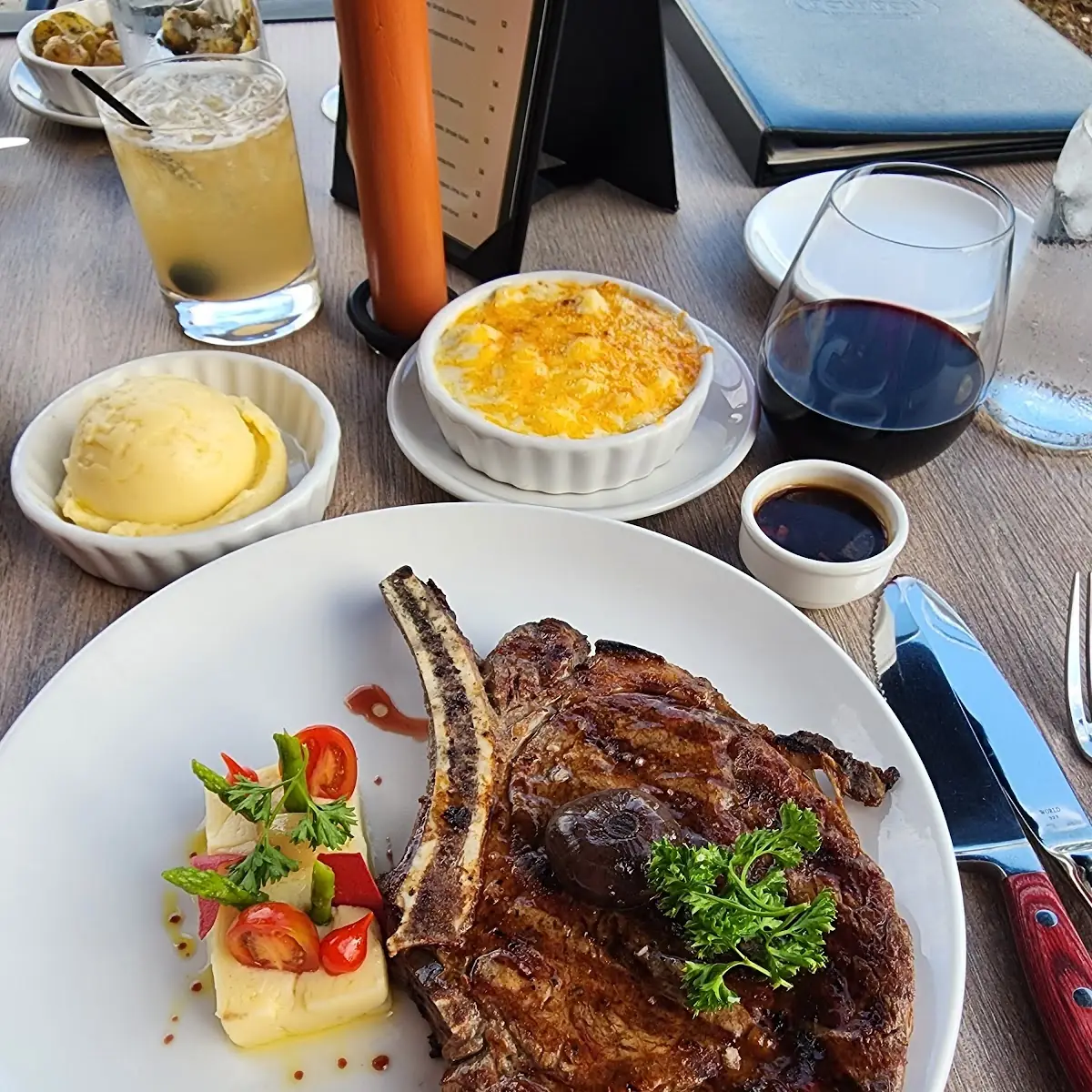 Cowboy Steak with Mac and Cheese and Mashed Potatoes