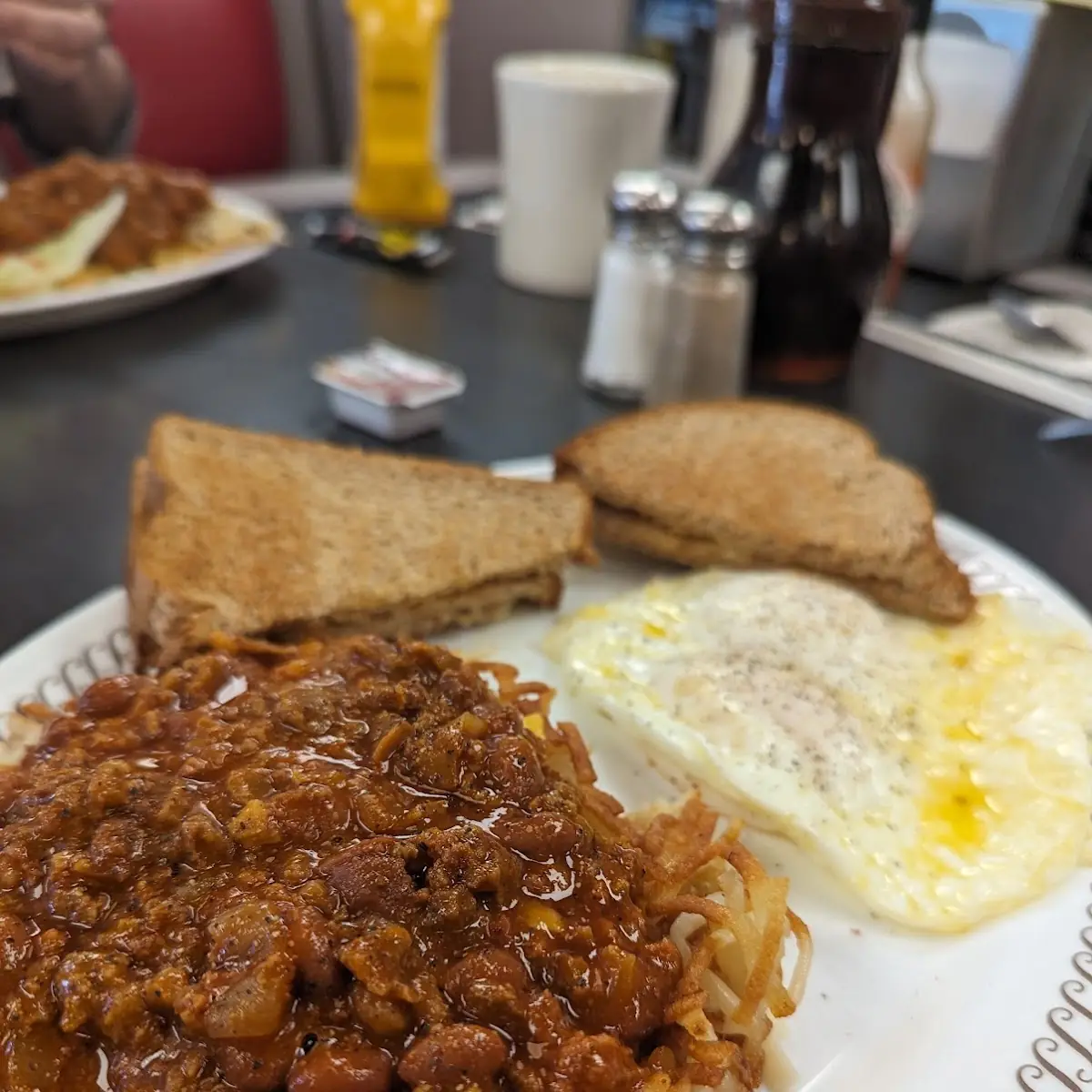 Two Eggs Double Hash Browns with Cheese and Chili and Toast