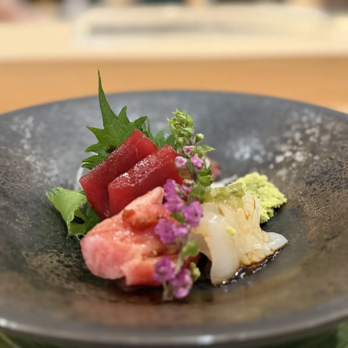 Assorted Sushi and Grilled Seafood Dishes