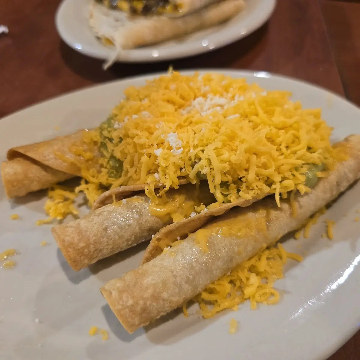 Rolled Tacos Beef with Guac & Cheese