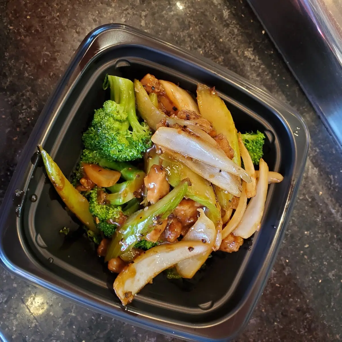 Black Pepper Chicken with Mixed Greens on the Bottom