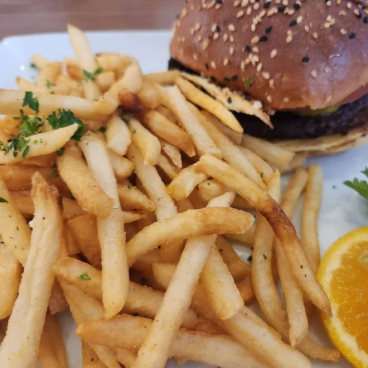 Avocado Burger with Pepper Jack Cheese's and Onions Avocado and Bacon with French Fries