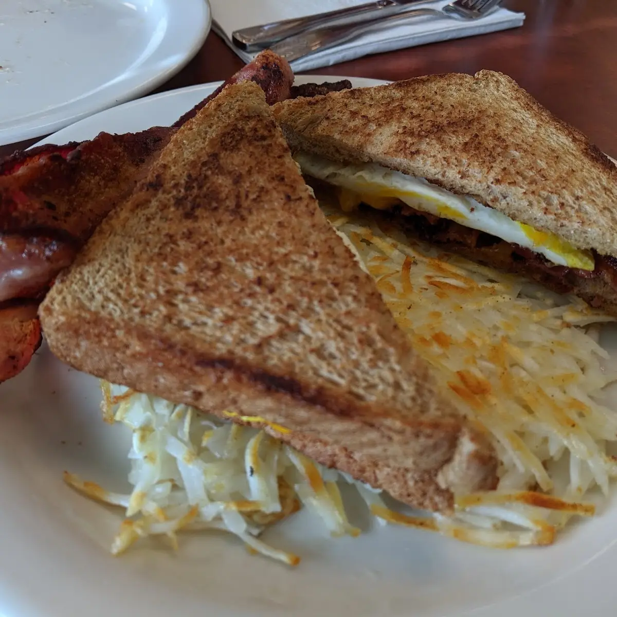 Bacon Egg and Cheese Breakfast Sandwich with Potatoes