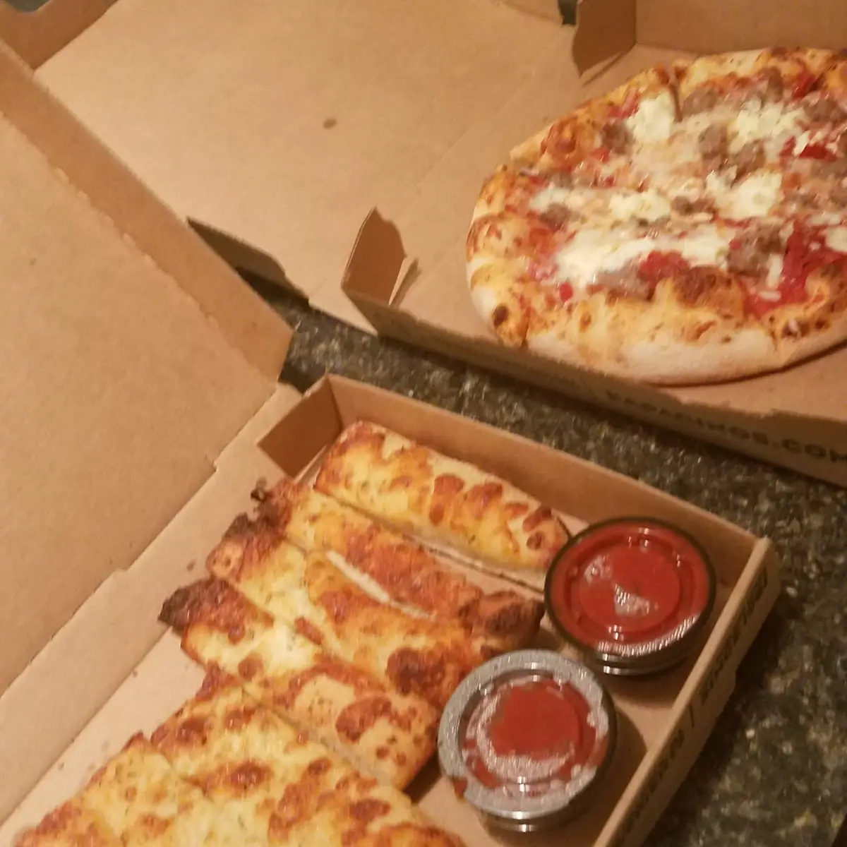 Bread Sticks and Sausage Ricotta Pizza