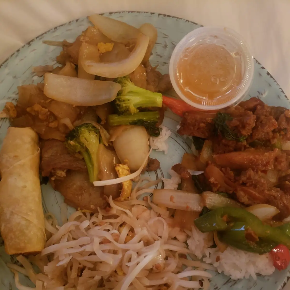 Pad Thai Pad See EW Crispy Basil Chicken and Spring Roll