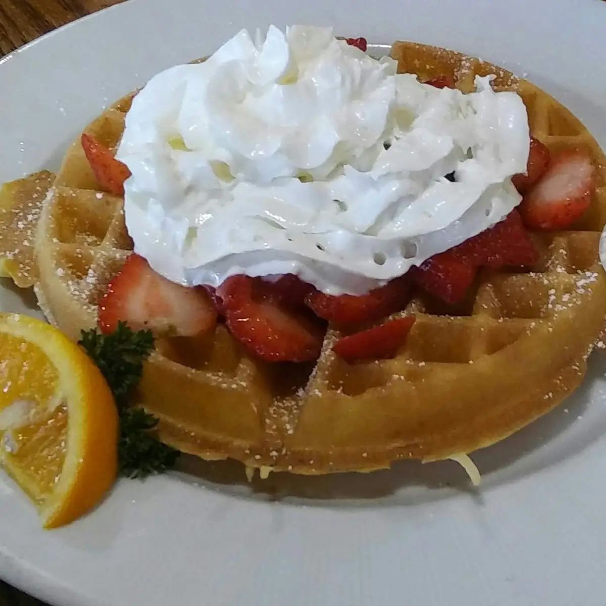 Belgian Waffle with Strawberries and Whipped Cream