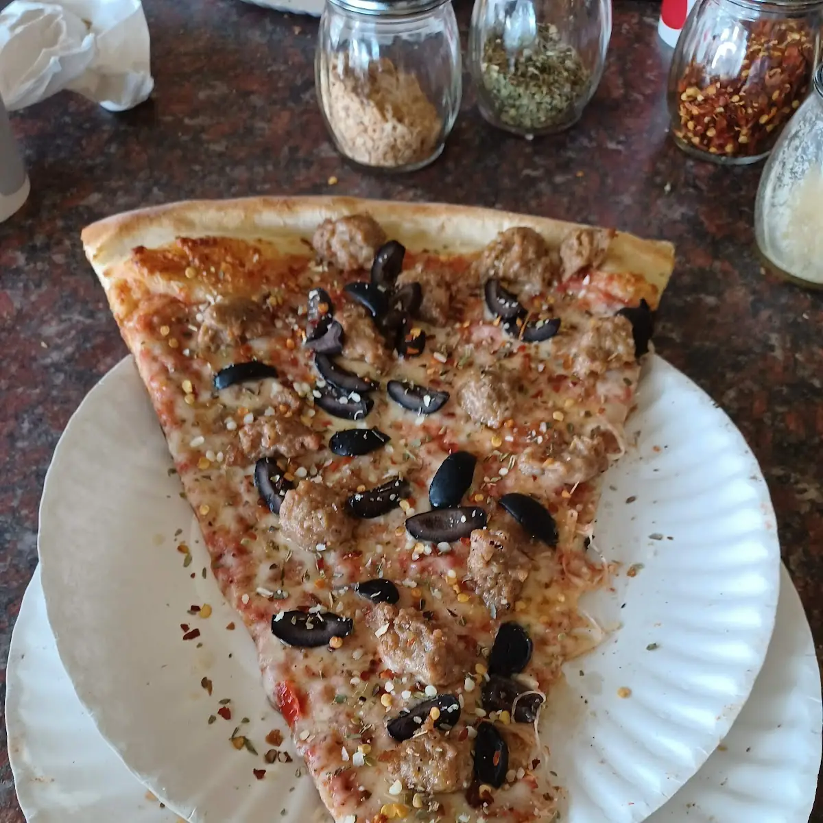 Sausage and Olive Pizza Slice