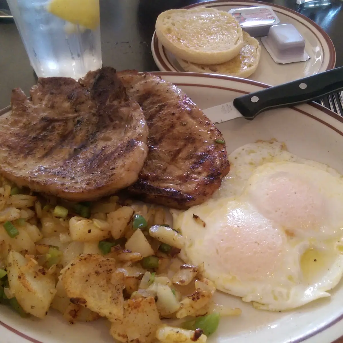 Pork Chop Breakfast with Eggs and Potatoes It Was Enough for Two Meals