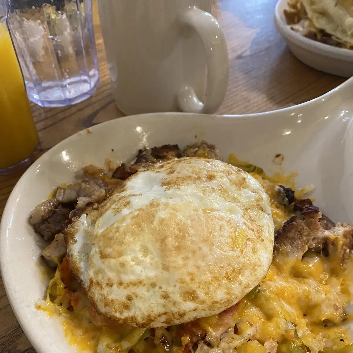 Fried Eggs over Cheesy Hash