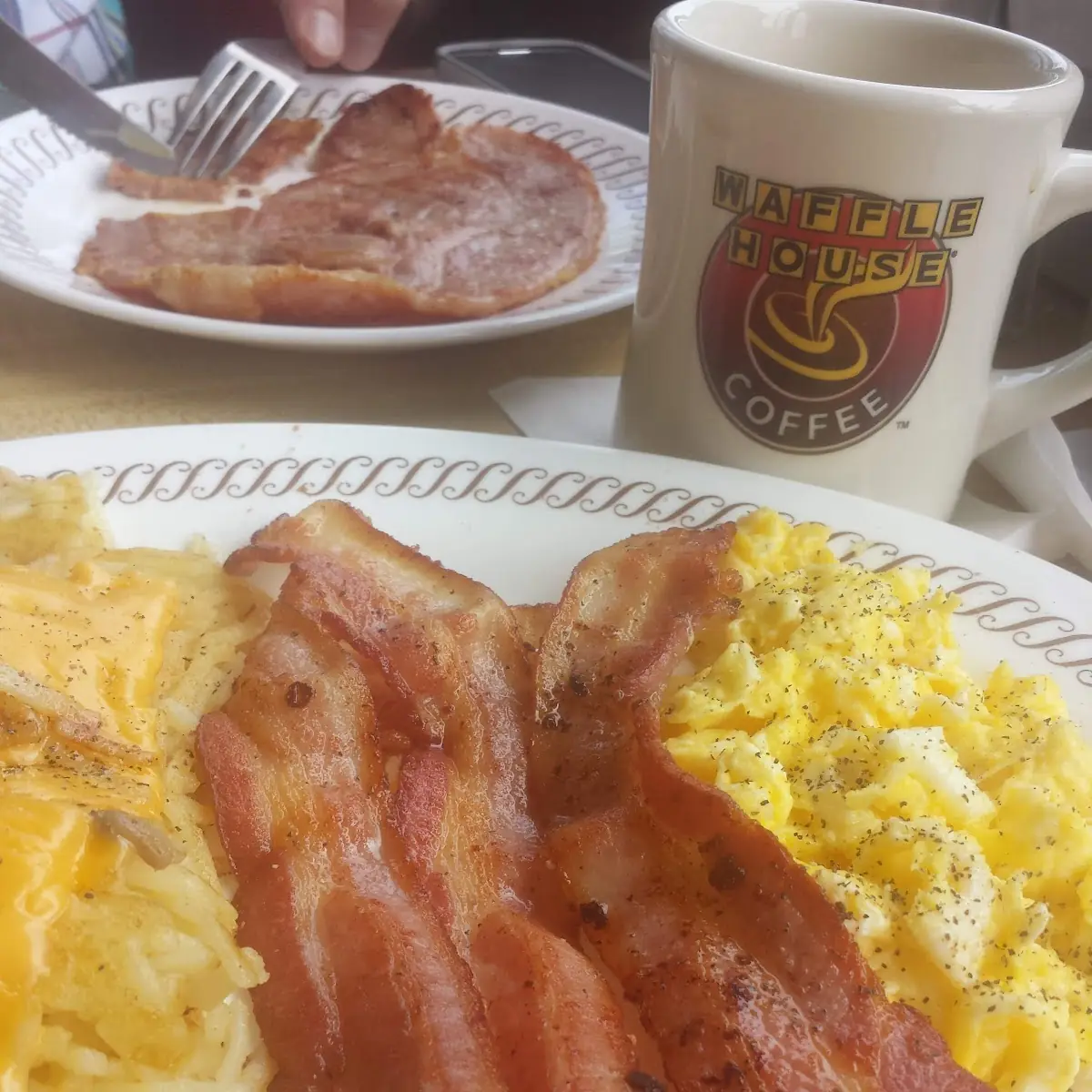 Eggs Bacon and Hash Browns Scattered Smothered and Double Covered