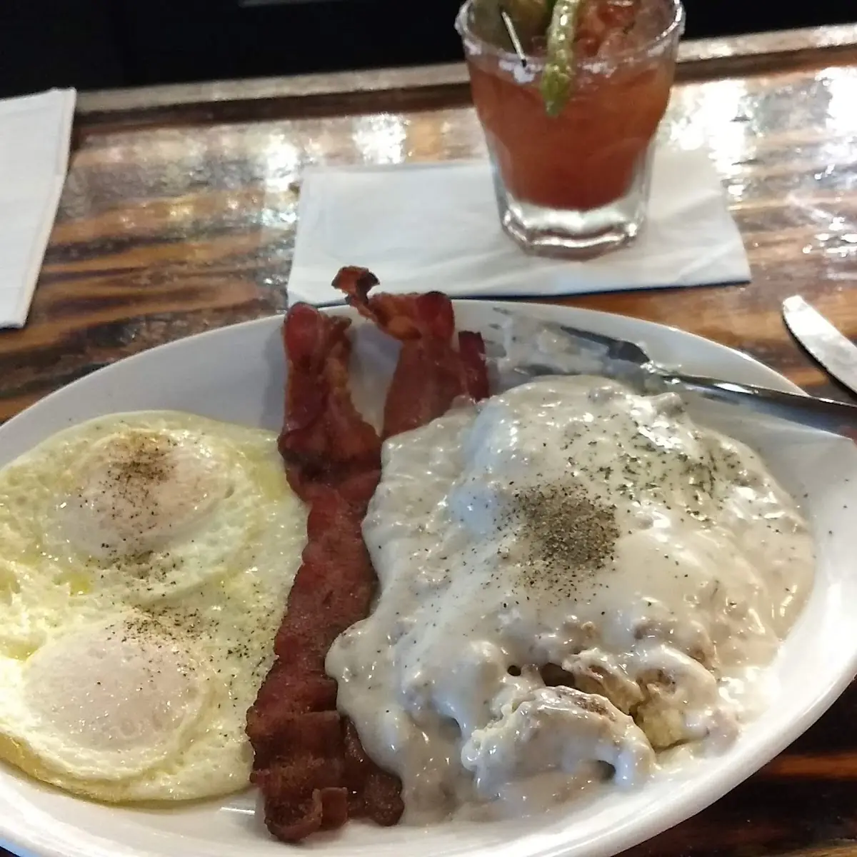 Eggs Bacon and Half Order Biscuits and Sausage Gravy