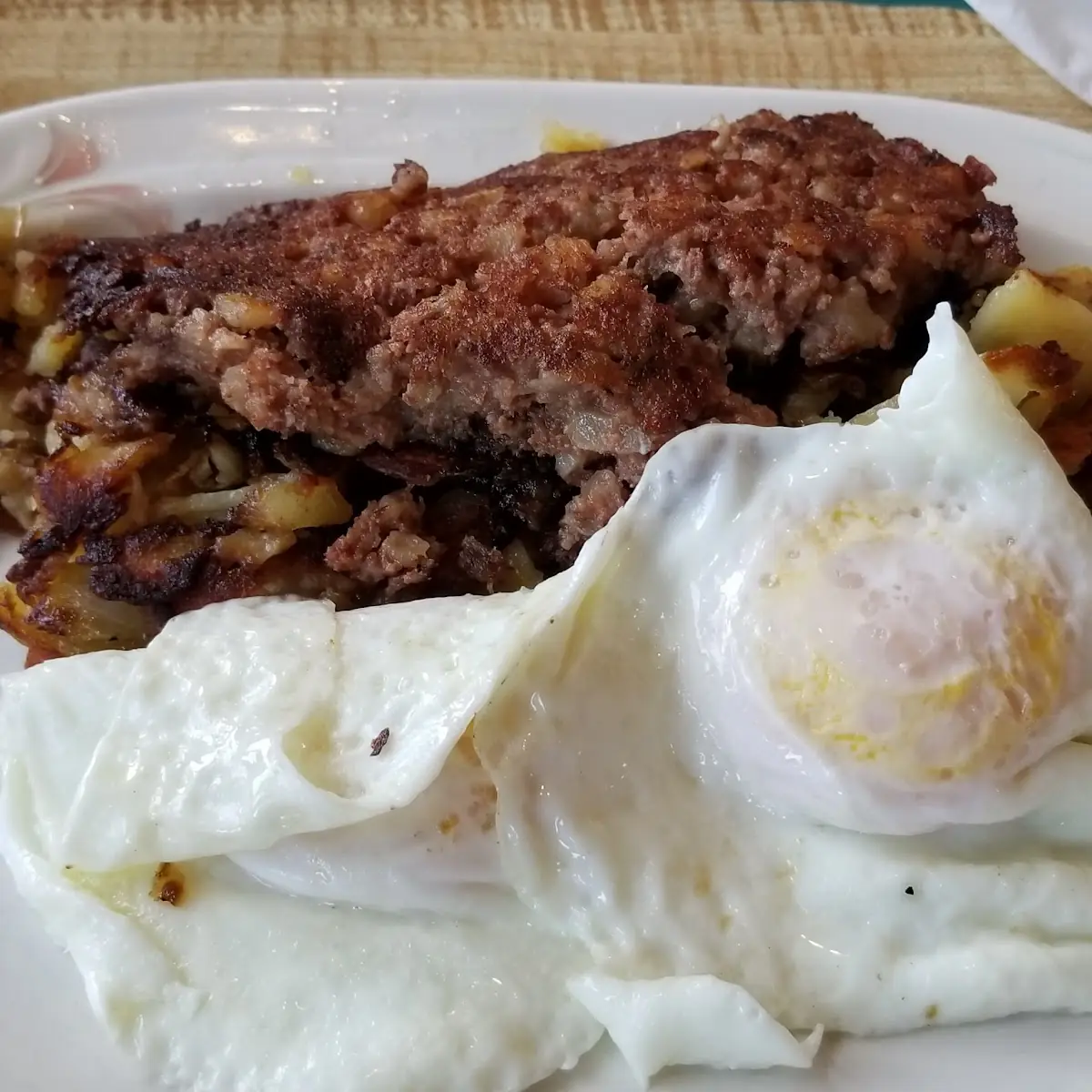 Over Easy Eggs and Beef Hash Brown