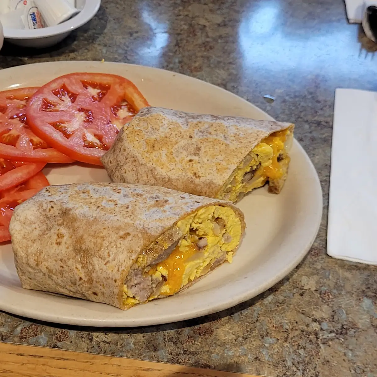 Sausage Egg and Cheese Wrap with Fresh Sliced Tomatoes