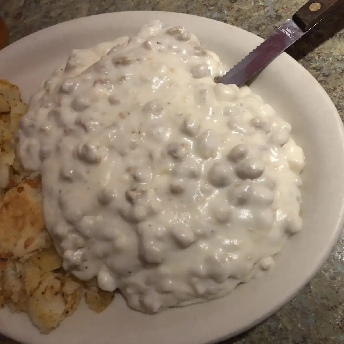 Sausage Gravy over Biscuits