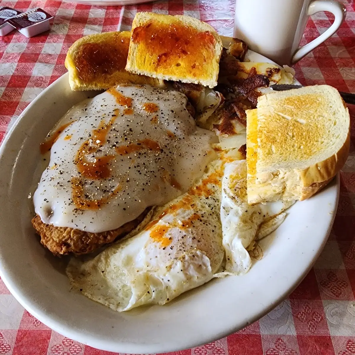 Chicken Fried Steak and 2 Eggs and Toast