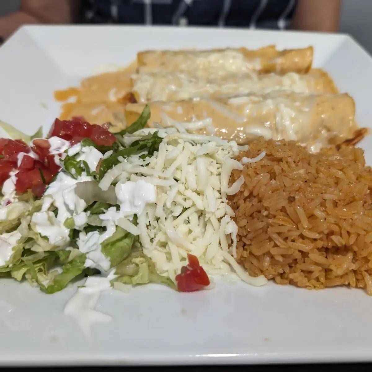 Creamy Chicken Enchiladas with Rice