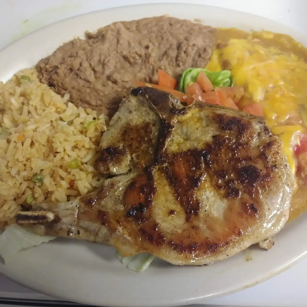 Pork Chop and Cheese Enchilada