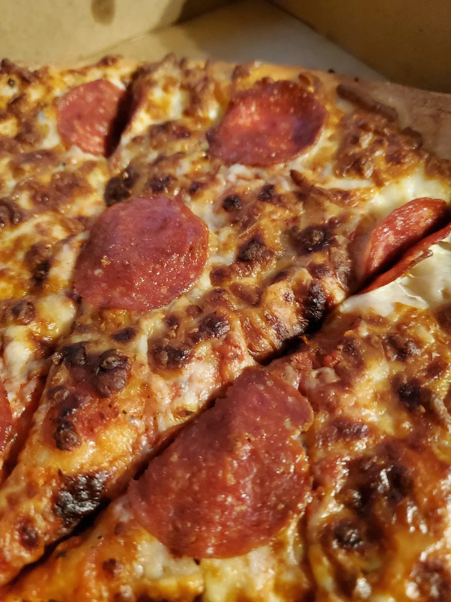 Cold and Hard Pepperoni Pizza