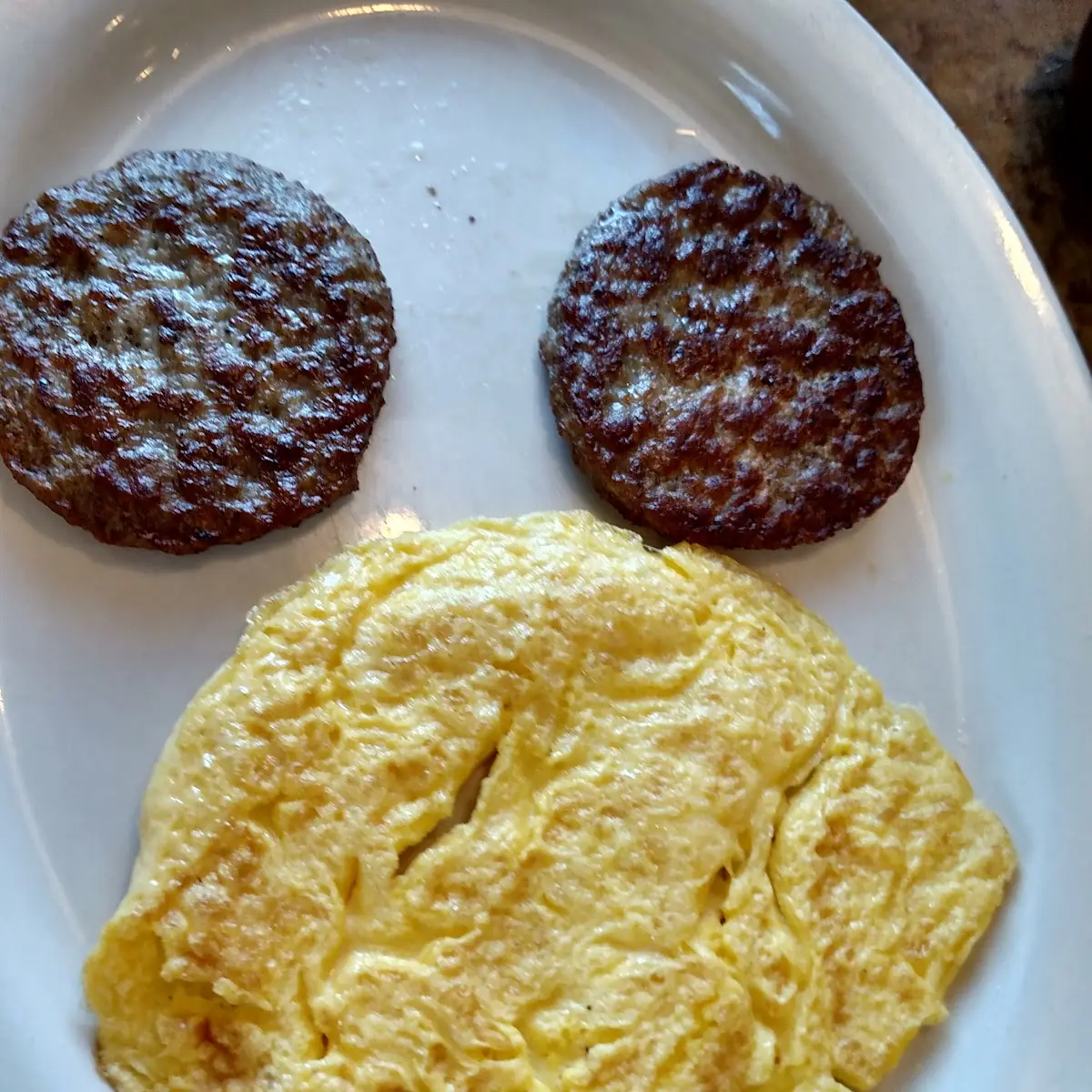 Scrambled Eggs and Sausage Looks Like Mickey Mouse