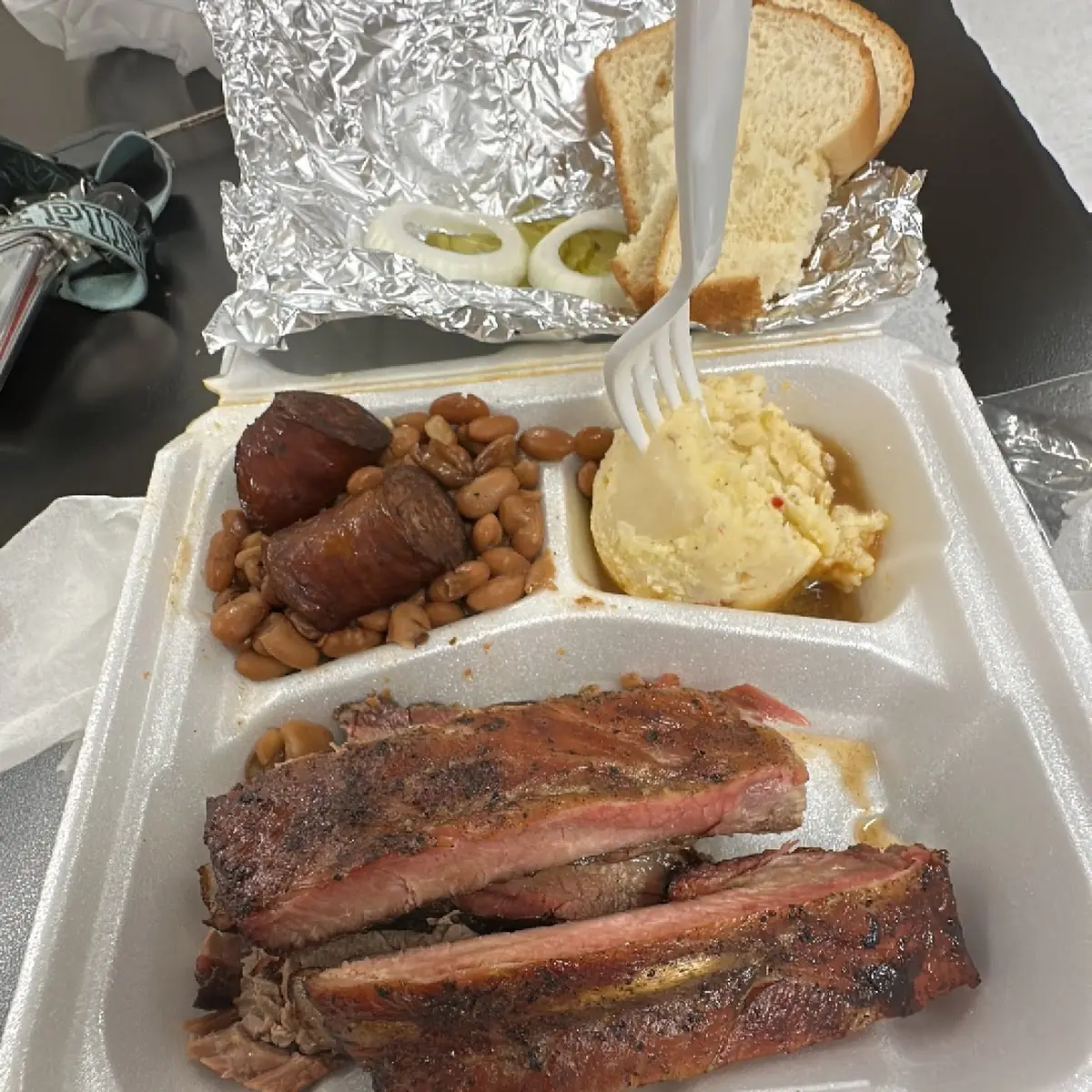 Sliced Brisket Plate with Mashed Potatoes and Green Beans