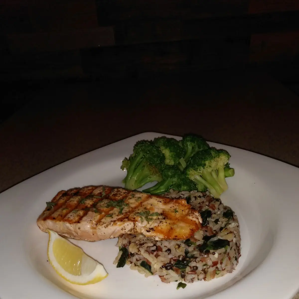 Grilled Salmon over Wild Rice with a Side of Vegetables